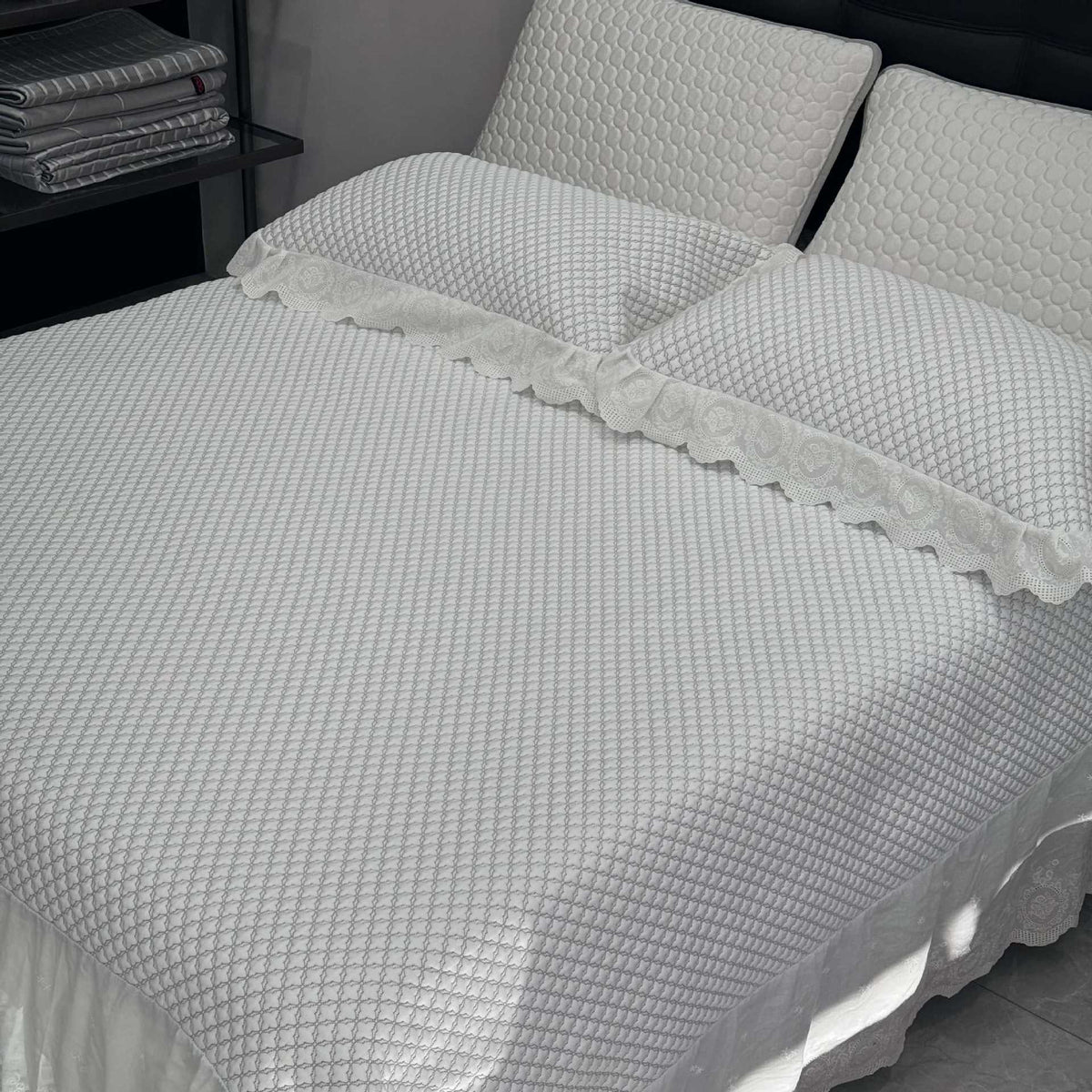 Quilted cotton bedspread set with honeycomb quilting, lace trim, and matching pillow covers