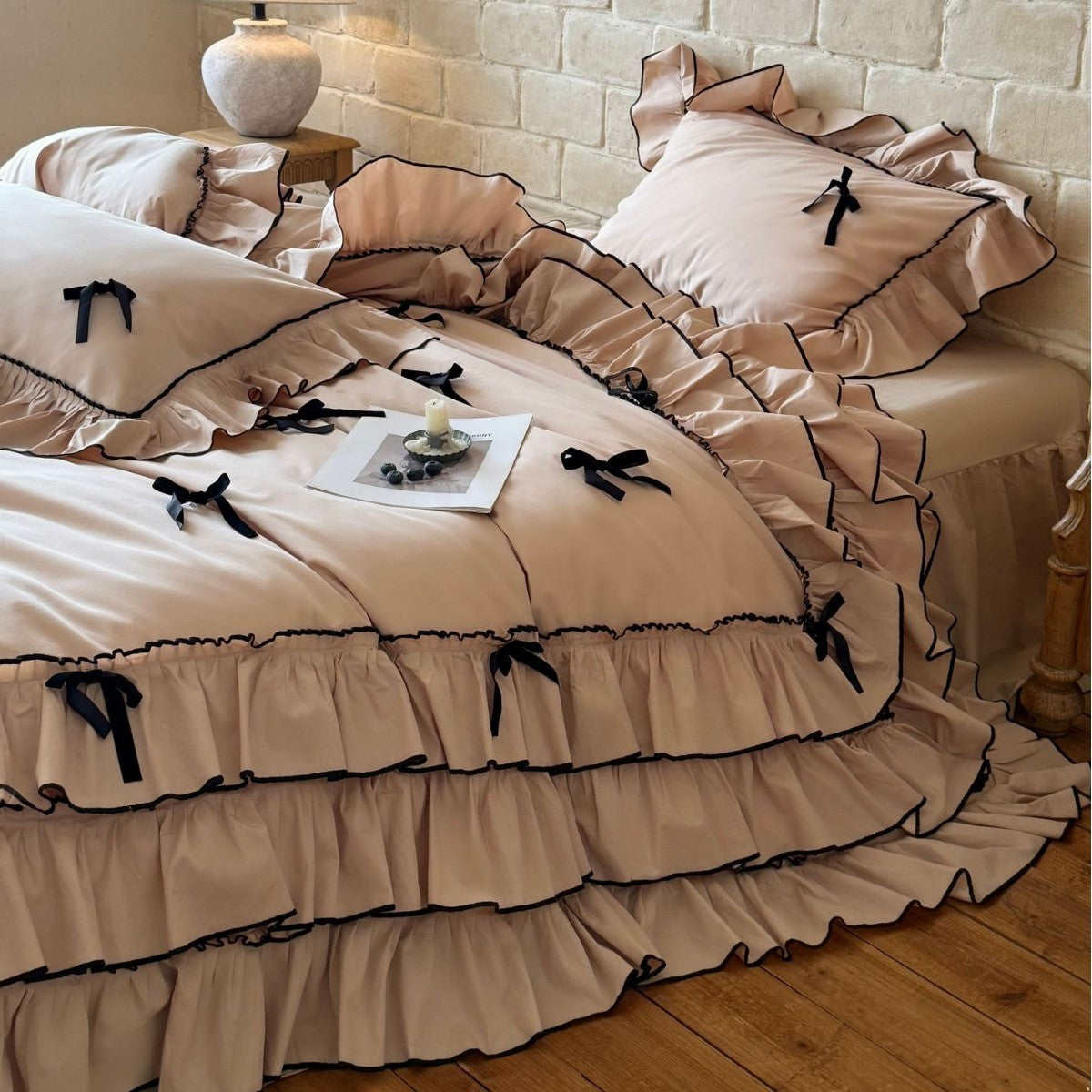 Romantic bedding set with ruffles, frills, and decorative bows