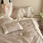 Romantic ruffled bedding set made of cotton-linen with rose embroidery and bed skirt