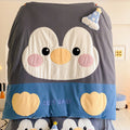 Cozy baby fleece blanket with penguin applique and play mat design