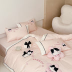 Bedding set with embroidered cat appliqués and soft cotton satin
