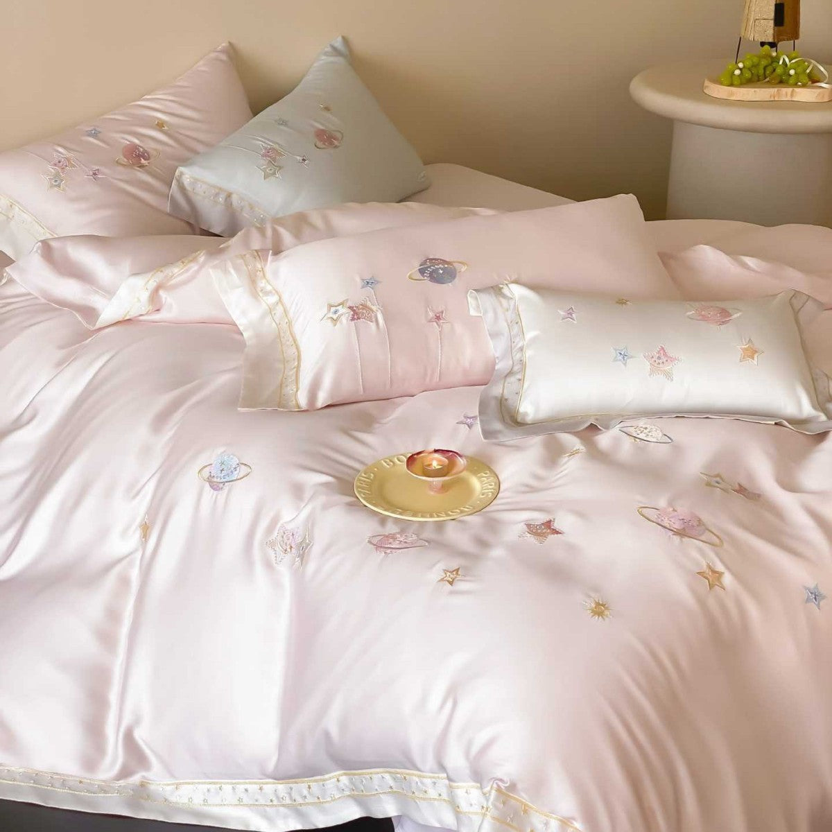 Satin bedding set with embroidered galaxy motif and silky smooth finish
