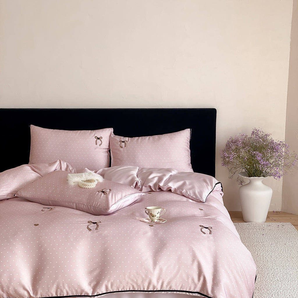 Luxurious satin bedding set with delicate polka dots and bow embroidery