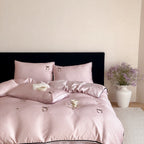 Luxurious satin bedding set with delicate polka dots and bow embroidery
