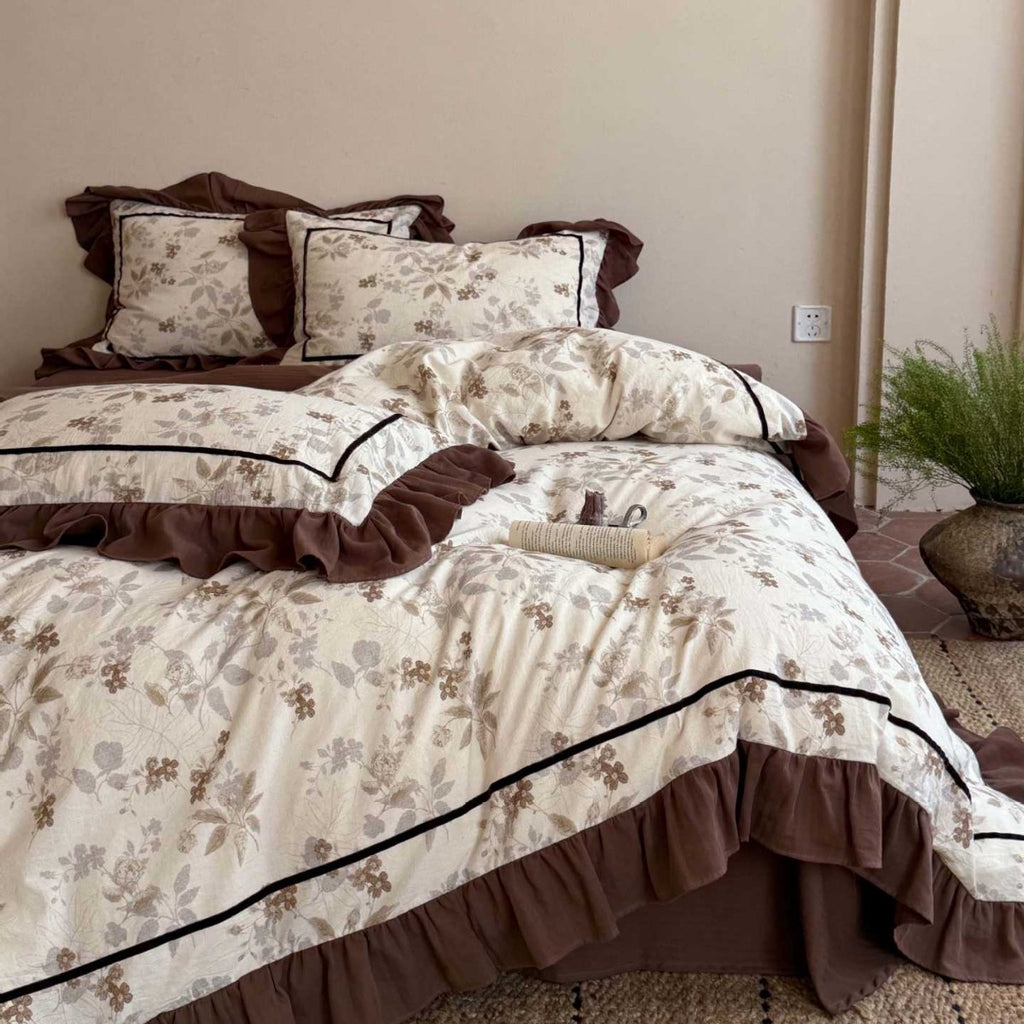 Floral cotton bedding set with ruffles and fine piping