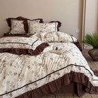 Floral cotton bedding set with ruffles and fine piping