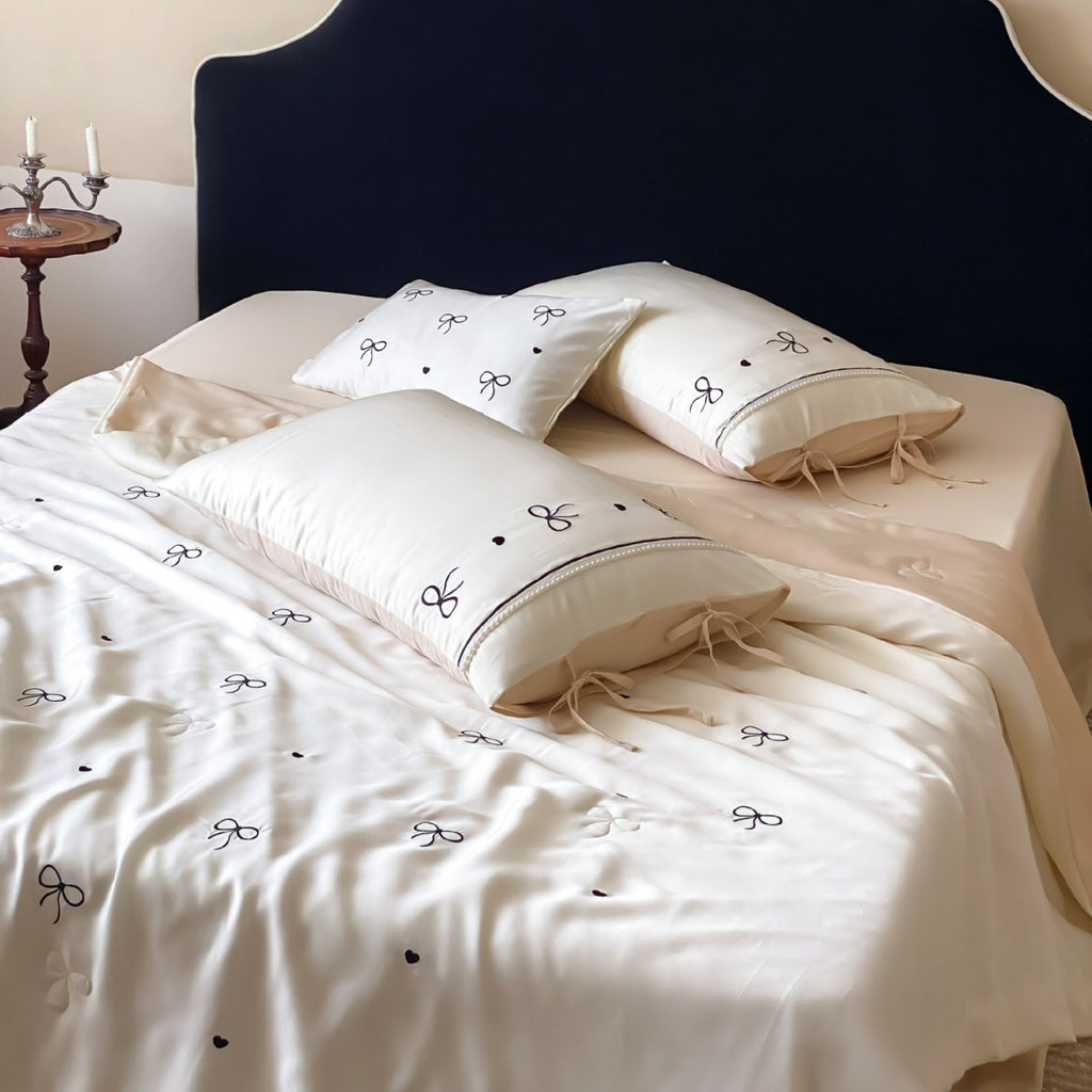 Fine silk look cotton satin bed linen set with delicate ribbon embroidery and ties
