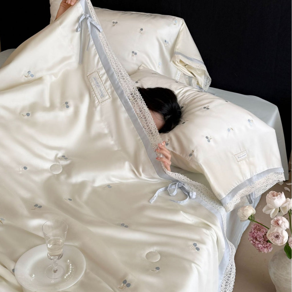 Luxurious cotton satin bedding set with cherry print, lace trim and frill