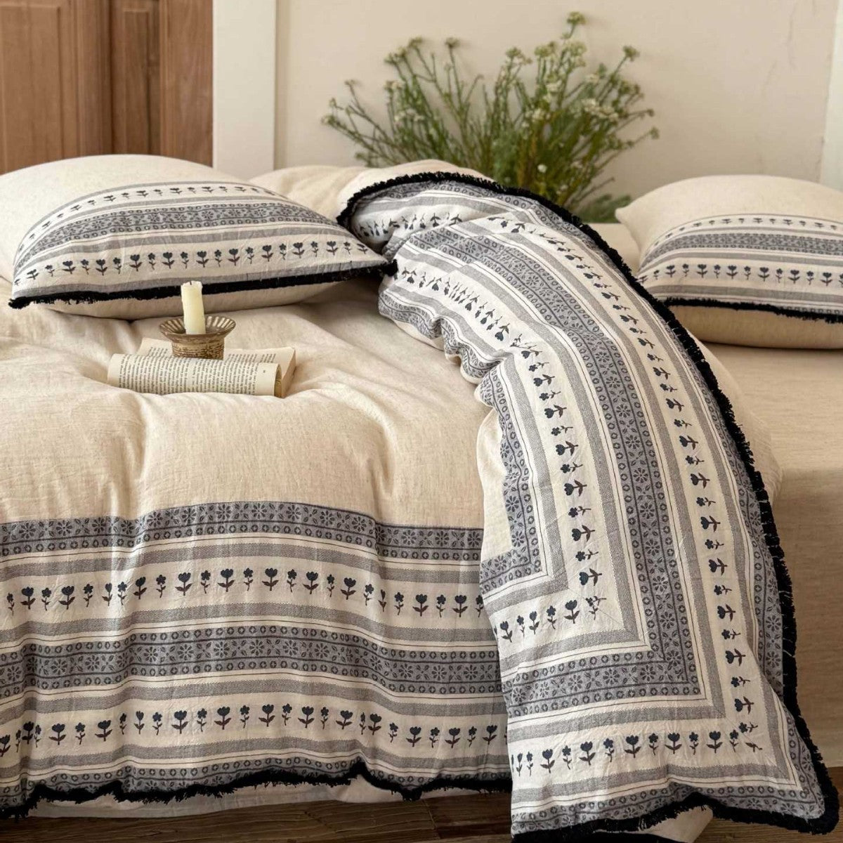 Country house style bedding set with striped floral border and fringes