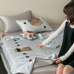 Children's bedding set with quilted cover and bear application