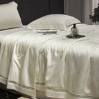 Luxurious quilted bedspread with satin jacquard and decorative border