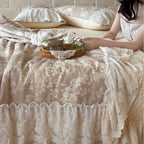 Padded bedspread set with multilayer lace trim and floral woven texture