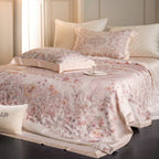 Luxurious cotton satin bed linen set with delicate floral print and quilted bedspread