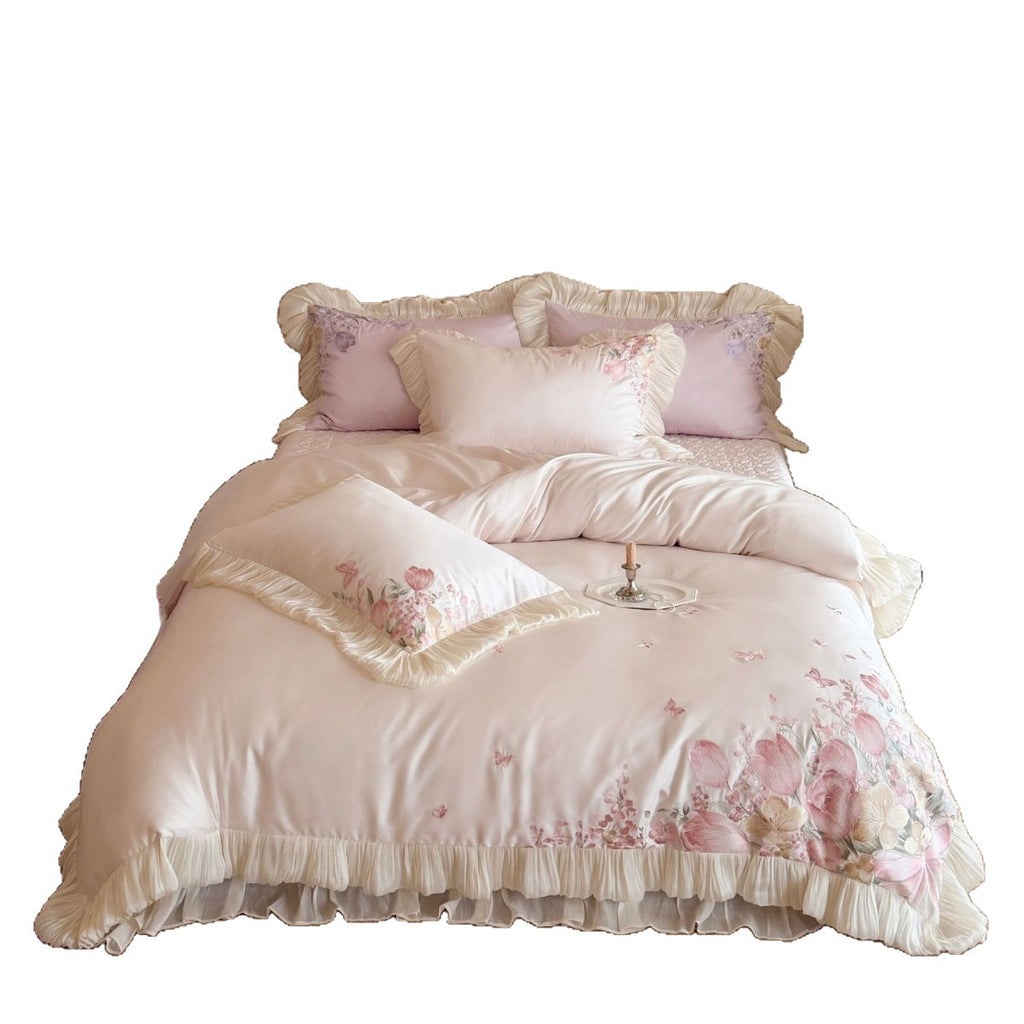 Luxurious embroidered satin bedding set with ruffles and floral details