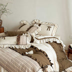 Country house style cotton-linen bedding set with ruffles, striped bedspread and decorative pillow