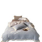 Reversible cotton satin bedding set with fine jacquard structure and lace trim