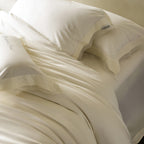 Noble cotton satin bedding set with fine lace trim and hotel closure