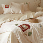 Child-friendly bedding set made of cotton percale with embroidered animal motifs