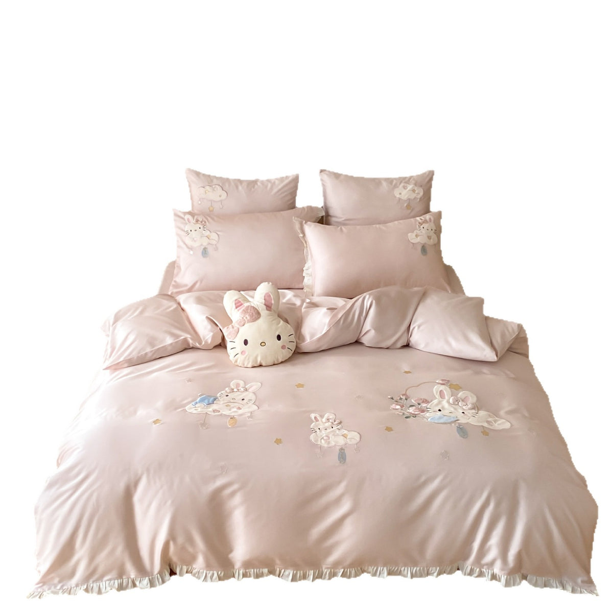 Playful children's bedding set made of silky-soft cotton satin with appliquéd bunnies and cuddly pillow
