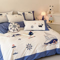 Maritime bedding set for children with embroidered sail and sea motifs made of cotton percale