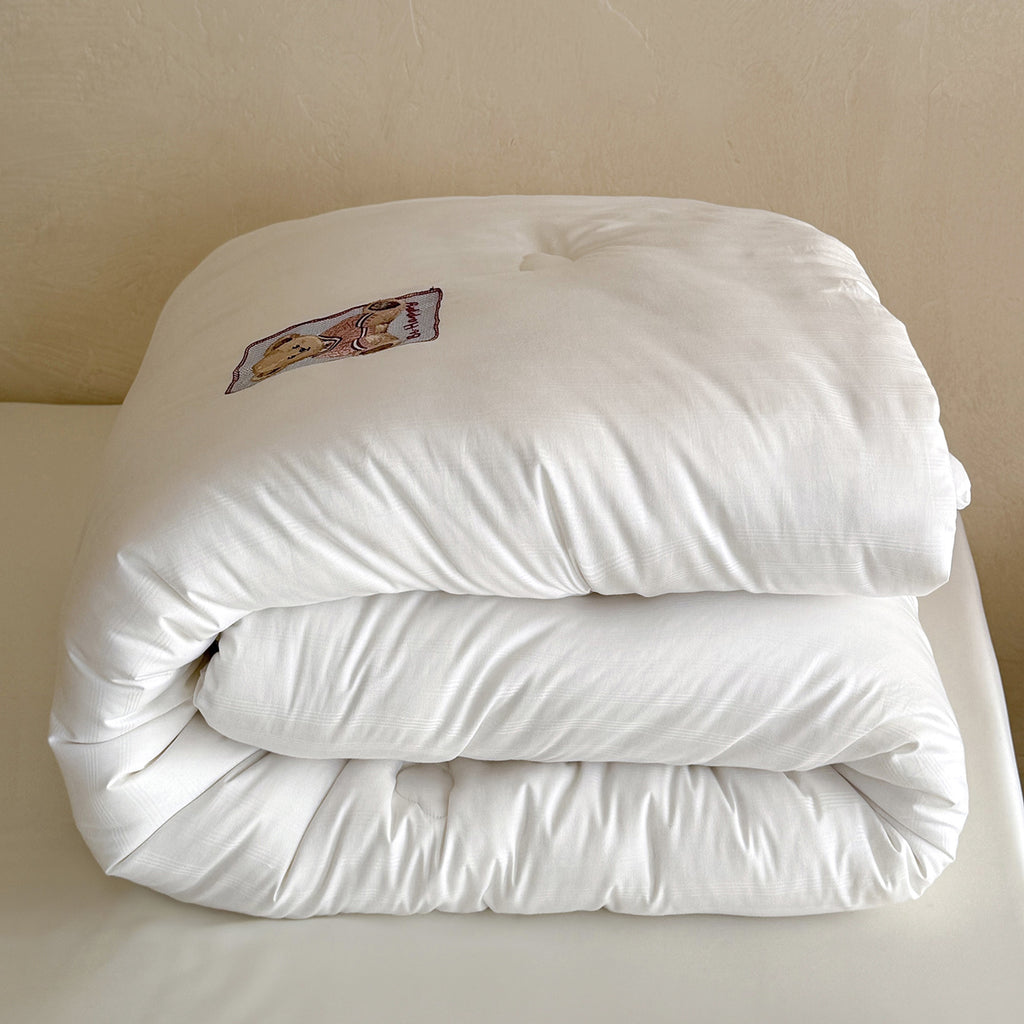 Quilted duvet with teddy applique and breathable microfiber filling