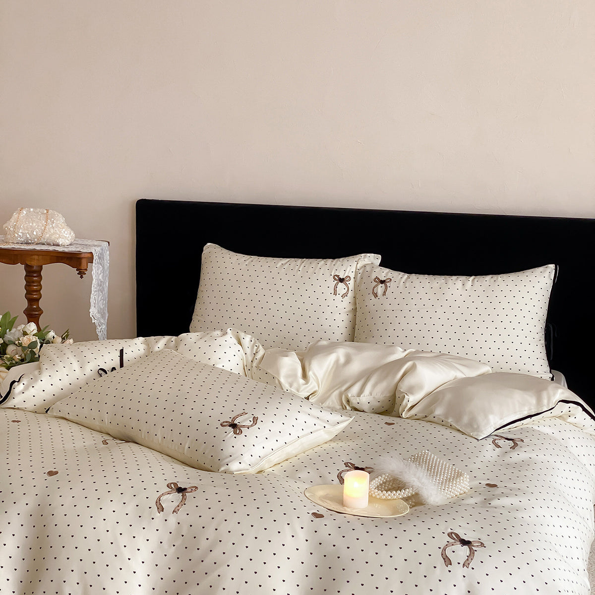 Luxurious satin bedding set with delicate polka dots and bow embroidery