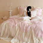 Luxurious satin bedding set with ruffles, pleated bed skirt and decorative pillow