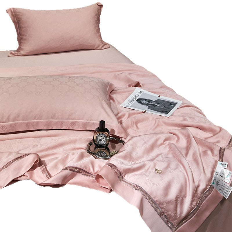 Luxurious quilted bedspread with satin jacquard and decorative border