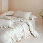 Quilted cotton-linen duvet cover set with subtle wrinkled texture and ruffle