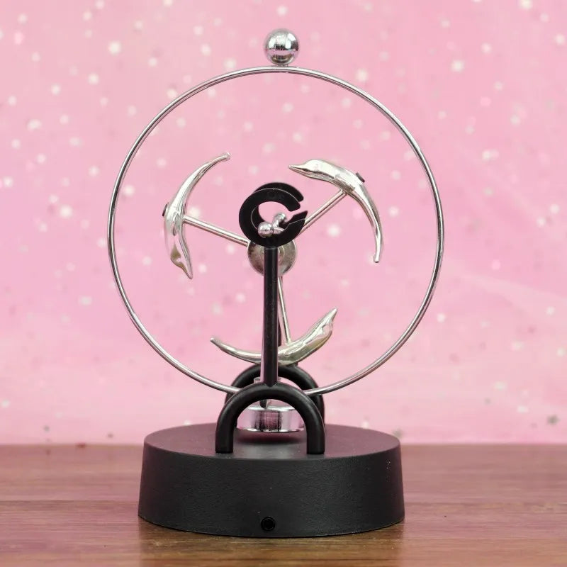 Newton Pendulum Ball, which represents perpetual motion