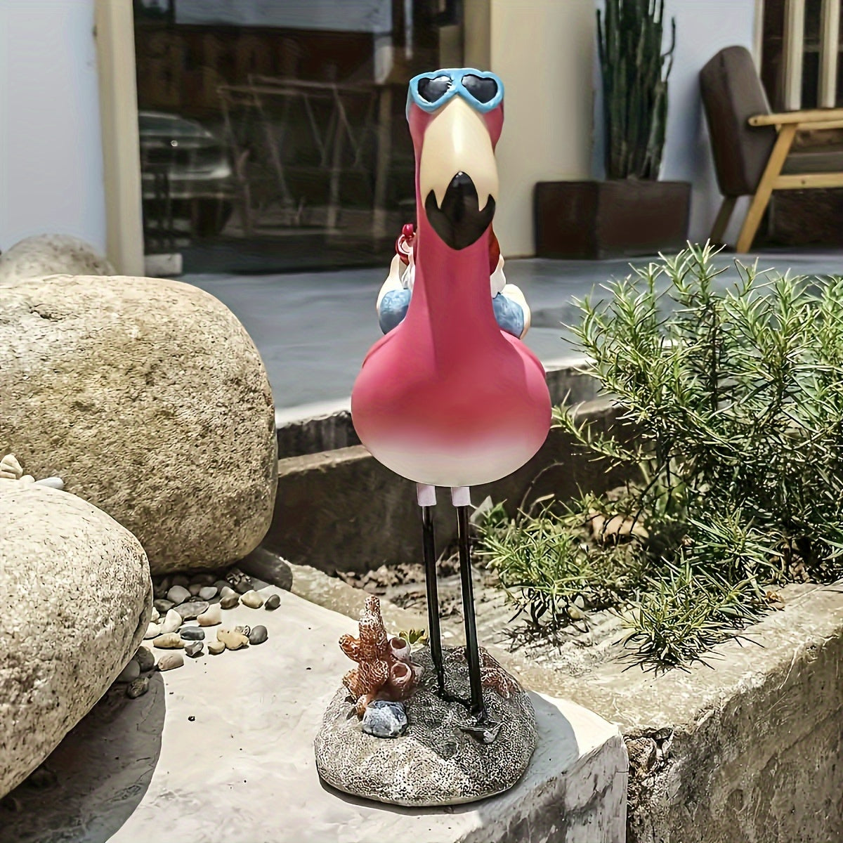 Flamingo relaxing garden gnome statue