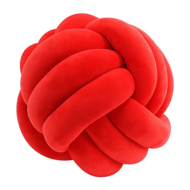 Decorative, soft cushion with knotted ball in suede look