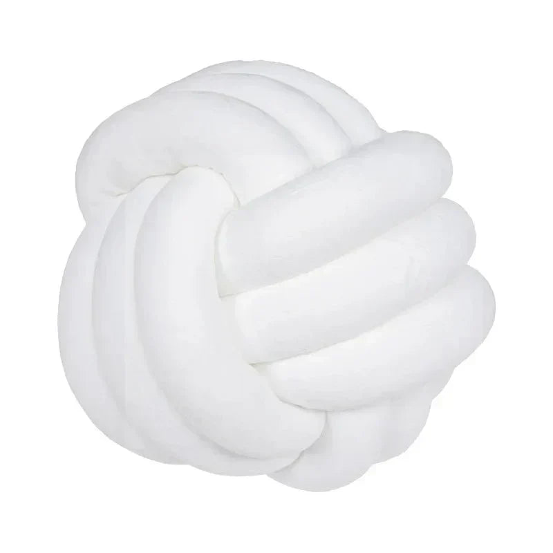 Decorative, soft cushion with knotted ball in suede look