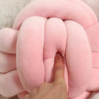 Decorative, soft cushion with knotted ball in suede look