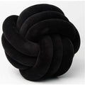 Decorative, soft cushion with knotted ball in suede look