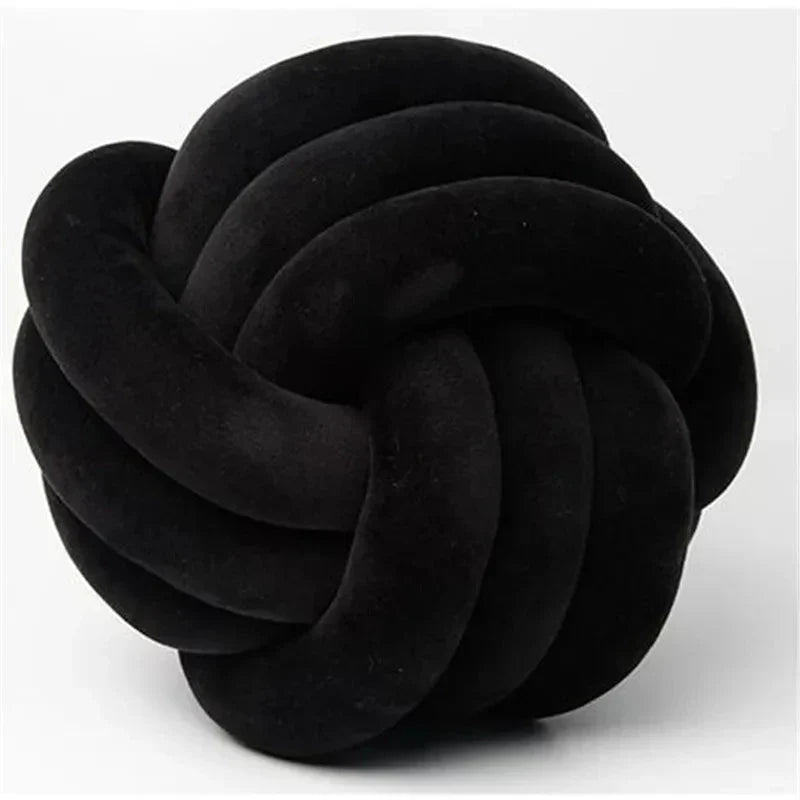 Decorative, soft cushion with knotted ball in suede look