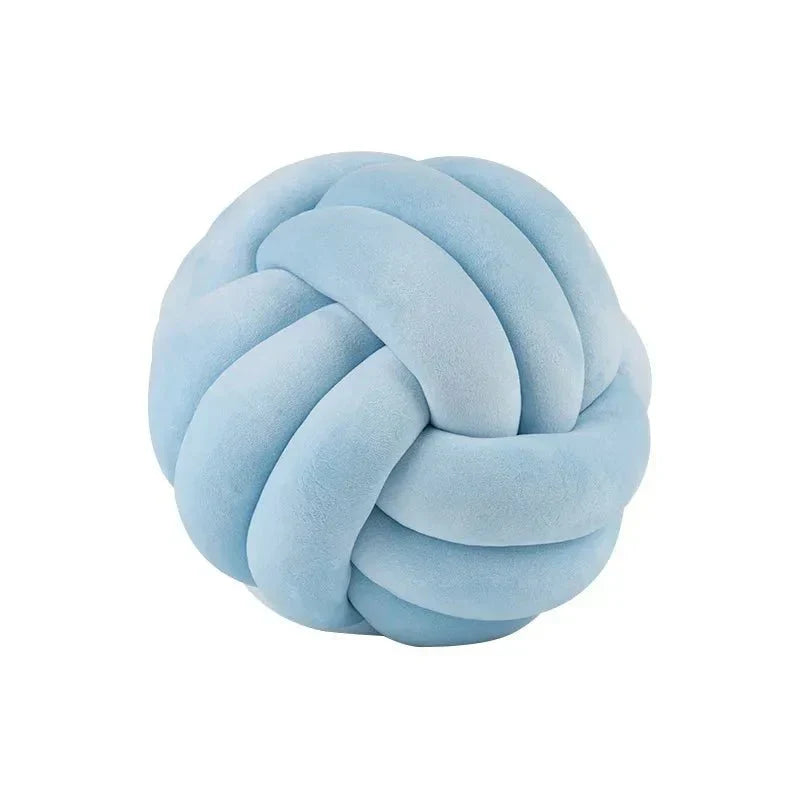 Decorative, soft cushion with knotted ball in suede look
